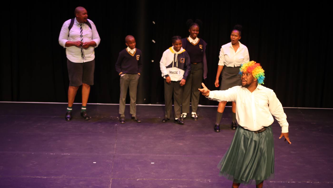 Mjojo cast performing a scene on stage